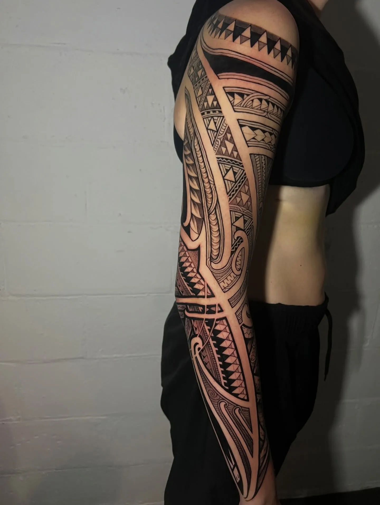 Polynesian tatau full sleeve, side view